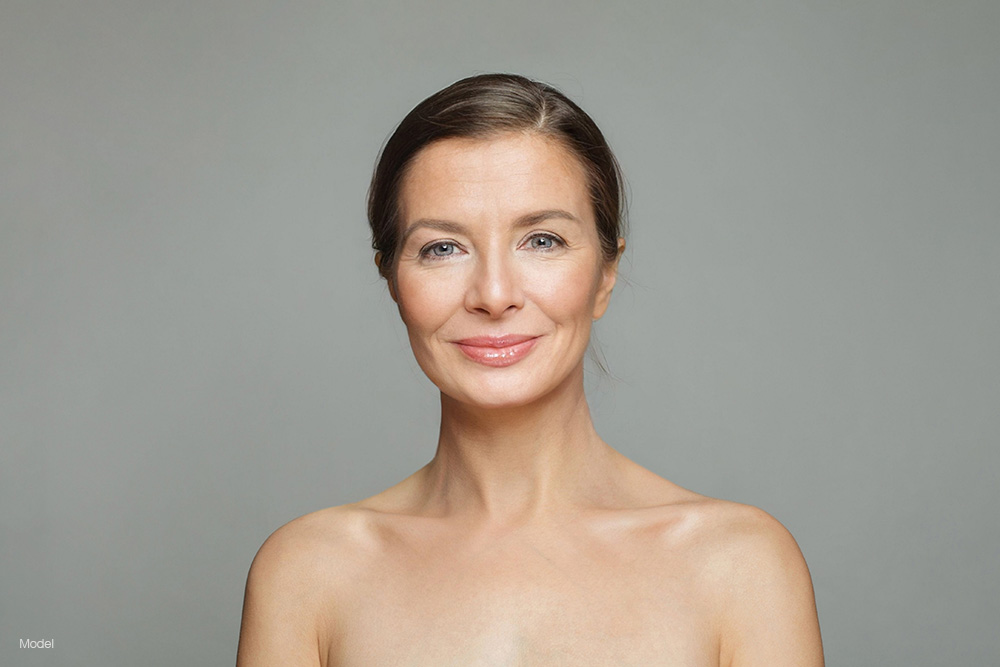 Mature woman with her hair back