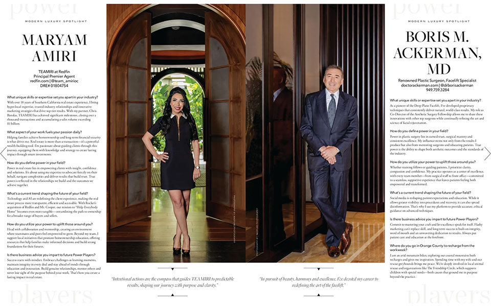 Two professionals standing in an elegant architectural setting with ornate wooden doorways and text columns on either side